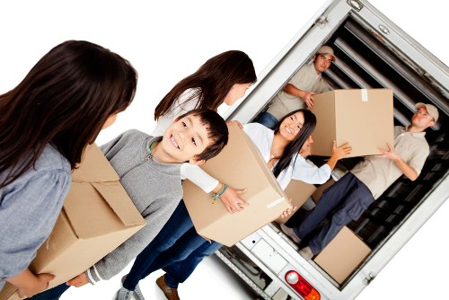 Removal van loading boxes into a vehicle