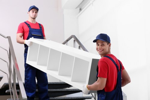 Student removal van loading boxes near a Watford property