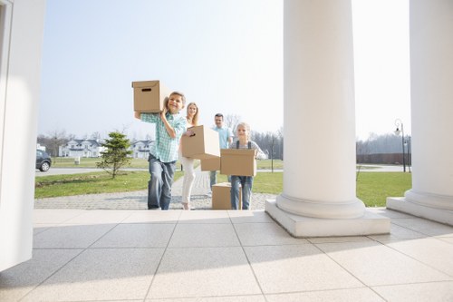 Business equipment and office furniture being prepared for a move
