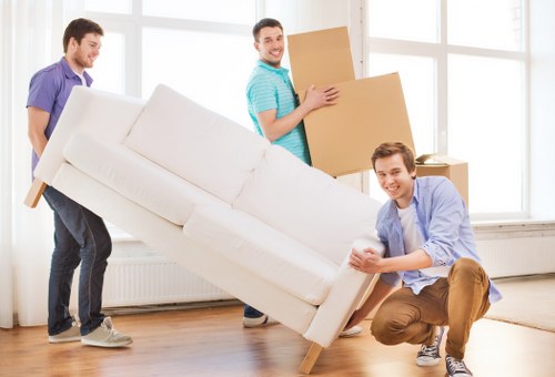 Household boxes and furniture prepared for transport in Watford
