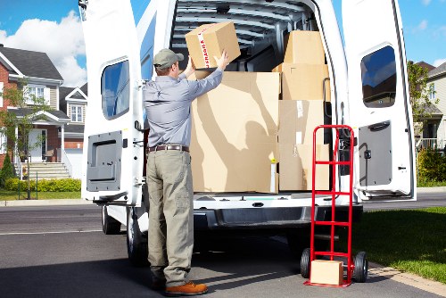 Packed boxes and furniture ready for a Watford apartment removal