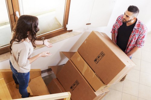 Packing boxes and furniture for a Watford removals job