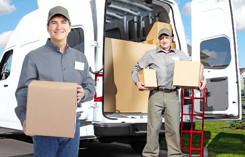 Removalists unloading belongings at a Watford home